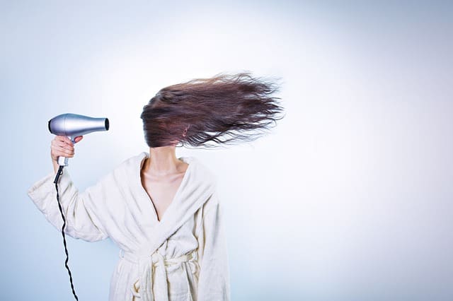 https://pixabay.com/en/woman-hair-drying-girl-female-586185/